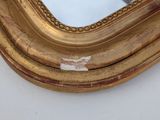a mirror that is sitting on a table