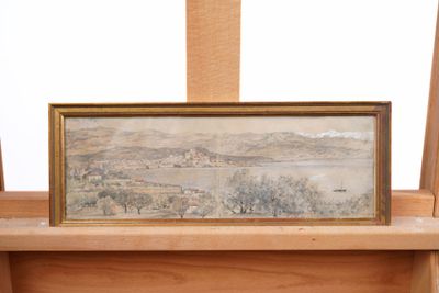 a picture of a painting on a shelf in a room