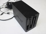 an image of a black charger on a white table