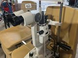 a machine that is sitting on a chair in a room