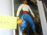 la photo d'un livre sur lequel figure la photo d'un homme
