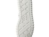 the sole of a pair of white shoes on a white background