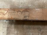 a piece of wood that has been scratched off with a piece of wood
