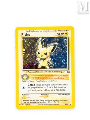 a close up of a pokemon card on a white surface