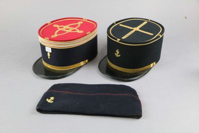 two hats that are sitting next to each other on a table