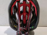a helmet that is on a table with a white background
