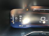 a digital display on the dashboard of a car