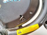 a close up of a motorcycle wheel with a sticker on it
