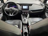 the interior of a car with a steering wheel, dashboard, and dashboard controls