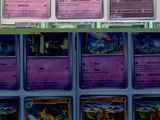 de nombreuses cartes Pokémon exposées dans un magasin