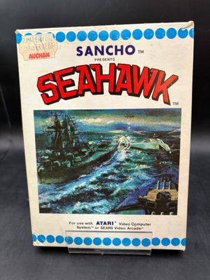 une vieille boîte de jeu sur laquelle figure l'image d'un bateau en mer