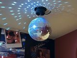 a disco ball hanging from the ceiling in a room