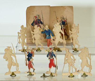 many figurines of soldiers on display in a glass case