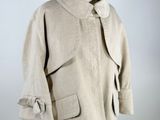 an image of a beige coat on a mannequin mannequin mannequin mannequin mannequin mannequin mannequin mannequin