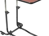 a small table with a red top and black legs