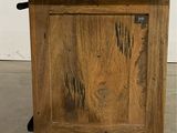 an image of a wooden cabinet with a door on it