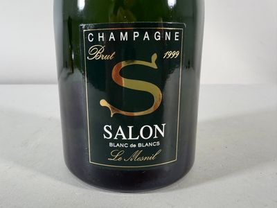 a bottle of wine that is sitting on a table