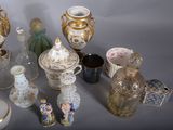 many different vases that are sitting on a table