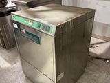 an image of a commercial dishwasher in a warehouse