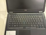 a laptop computer that is sitting on a table