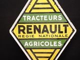 une image représentant un panneau jaune et vert sur un fond noir