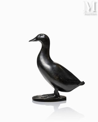statue of a duck on a pedestal on a white background
