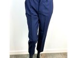 the mannequin is wearing a blue suit and black shoes