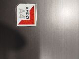 a sticker on the side of a stainless steel refrigerator