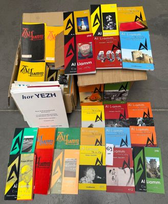 a lot of books that are sitting on the floor