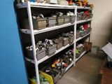 many bins of assorted items on the shelves