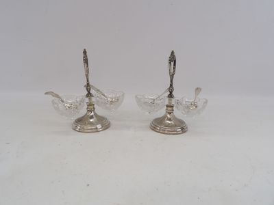 pair of silver plated candlesticks with handles