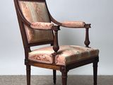 an image of a chair with a floral upholstered seat