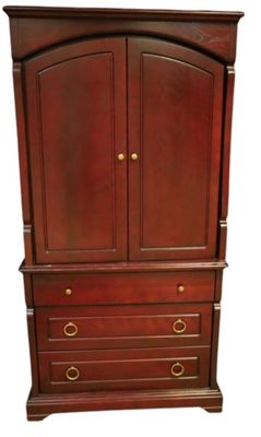 a wooden armoire with two drawers and two doors