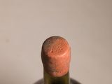 a bottle of wine that is sitting on a table