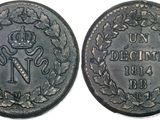 a close up of a coin with a crown on it