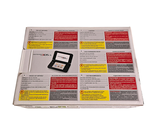 a picture of a cell phone sitting on top of a newspaper