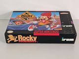an image of a box of nintendo games on a table