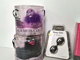 a box of ear buds and a box of earbuds on a table