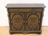 an image of a black and gold cabinet with two doors