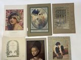 six framed pictures of women in hats and dresses on a white surface