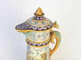 a large blue and white vase with a dragon on it