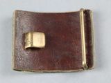 a brown leather belt with a gold buckle on it