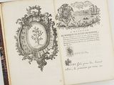 an open book with a picture of a castle on it