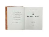 an open book with a black and white title on it