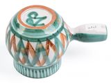 a green and orange teapot with an anchor on it