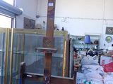 a glass case with skis on top of it in a room