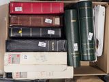 a box full of books sitting on top of a table