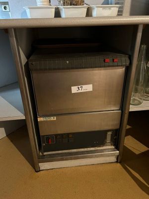 an image of a kitchen appliance that is in a cabinet