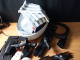 a picture of a table with tools and a helmet on it