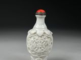 chinese white porcelain snuff bottle with red lid
